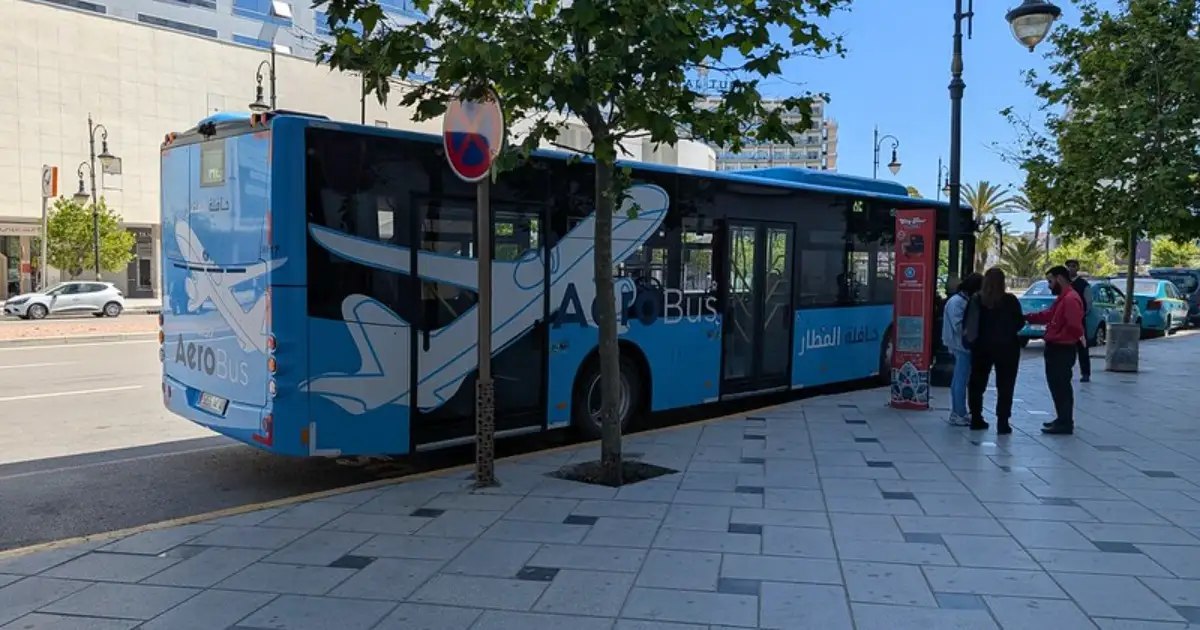 White Mercedes grand taxi waiting at Tangier Med port taxi rank for passengers to Tangier